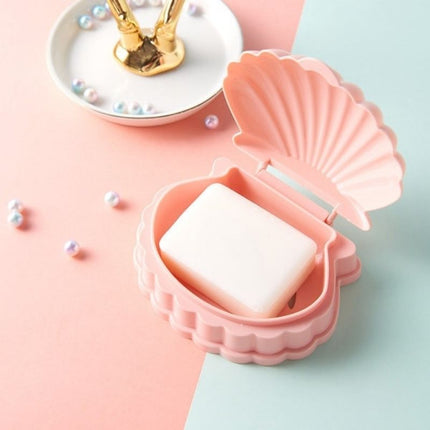 Jabonera de viaje con forma concha