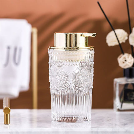 Dispensador de jabón de cristal dorado