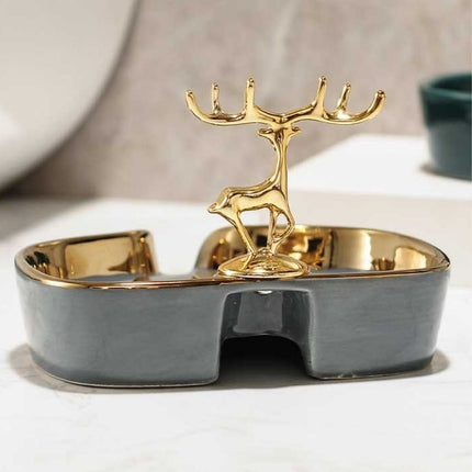 Jabonera decorativa con ciervo dorado